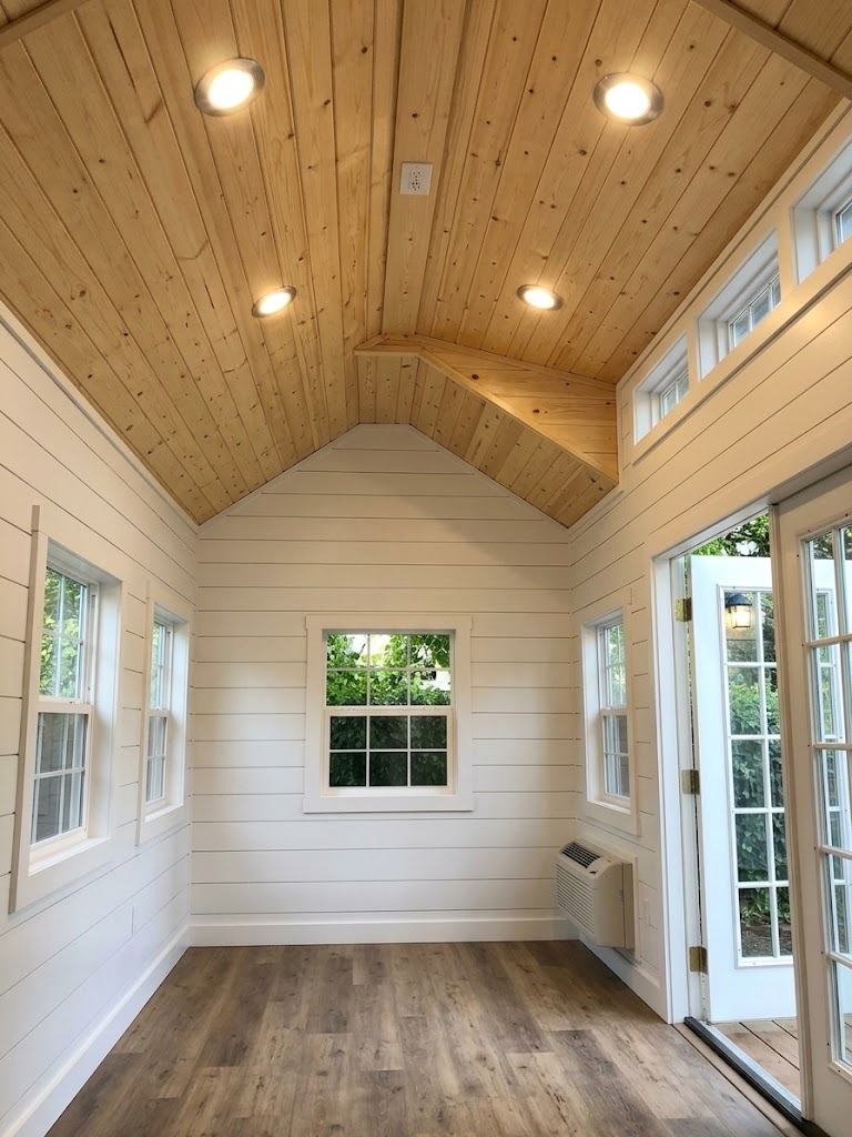 Shiplap studio interior with pine ceiling